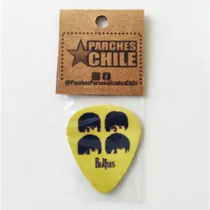 Uñeta impresa de la banda de The Beatles