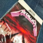 Empaque con la espaldera de Metallica Master Of Puppets Espaldera Sublimada dentro