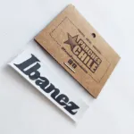 empaque con Adhesivo Decal para clavijeros de Ibanez color negro